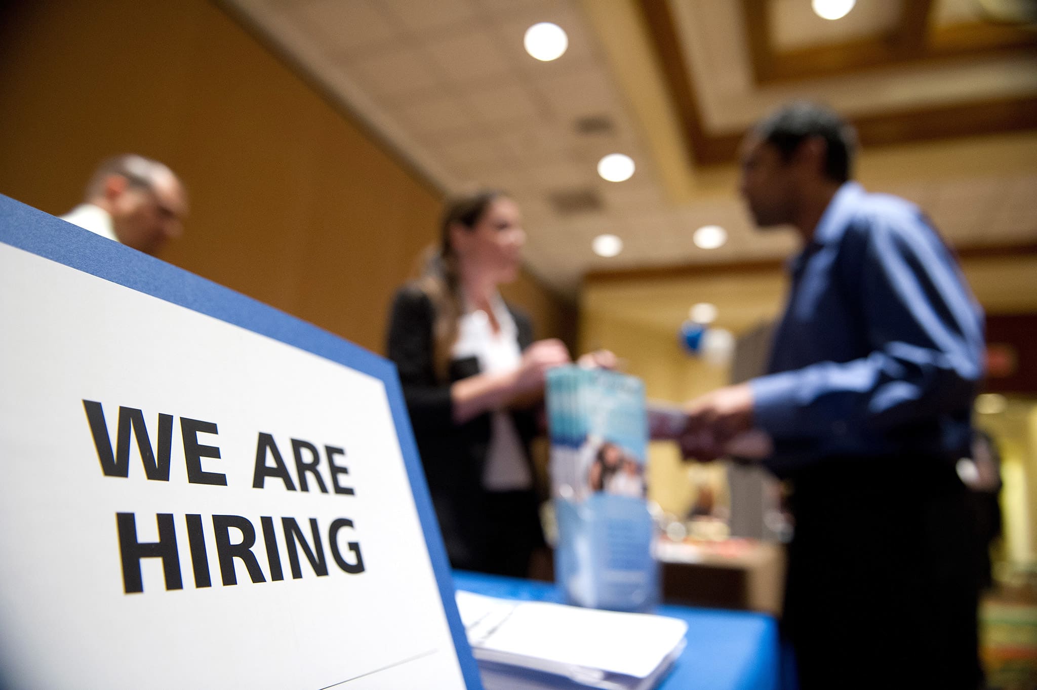 100286020-job-fair-hiring-sign-california-gettyp